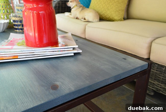 Thrifted Coffee Table's Bold Blue Stain Makeover 15 The wood tabletop after the blue stain has dried, showing its subdued tone