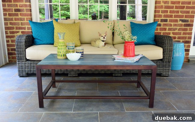 Thrifted Coffee Table's Bold Blue Stain Makeover 19 The sunroom with the new outdoor sofa and blue coffee table, showcasing the inviting atmosphere