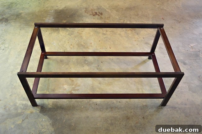 Thrifted Coffee Table's Bold Blue Stain Makeover 7 The metal frame of the thrift store coffee table, ready for a new top