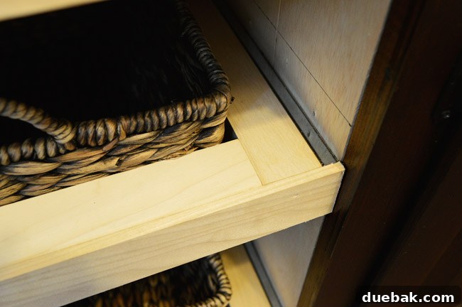 Adding thin decorative boards to the front of the drawers and shelf for a clean, finished look.
