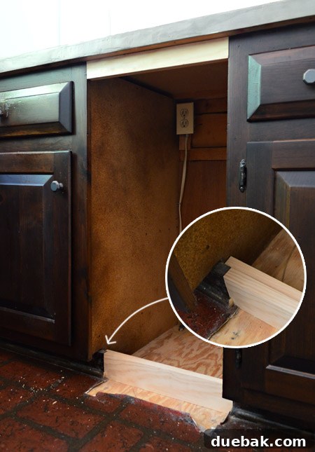 Initial carpentry work to create a cabinet-like structure, adding a top board and toe-kick.