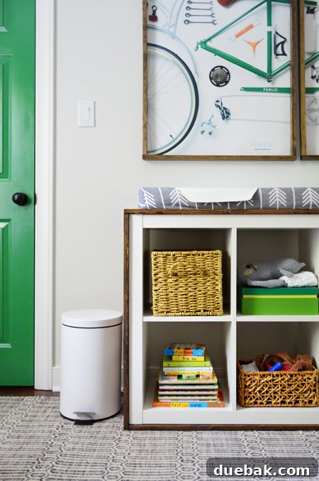 Expedit changing table with diapers, wipes, and changing pad