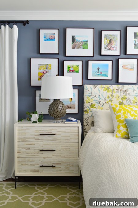 Close-up of a section of the family photo gallery wall with beach photo
