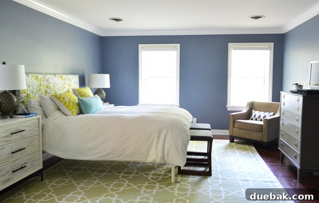 Sparse bedroom wall above bed before gallery wall installation