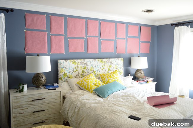 Paper templates taped on wall to plan gallery wall layout