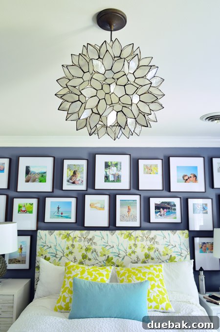 Bedroom with capiz chandelier from a wider angle