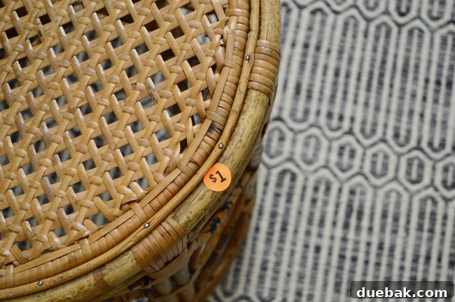 Upcycle Your Lamp into a Stunning Pendant Light 16 Close-up of the $1 price tag on the side table