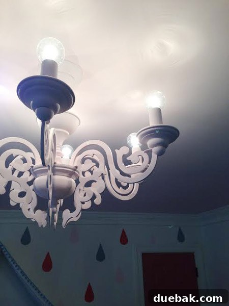 Ambient night shot of Clara's room, highlighting the soft, ethereal glow of the pink chandelier.