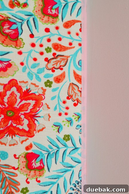 Transform Your Walls with Fabric 15 Final view of Clara's closet with the beautifully upholstered back wall