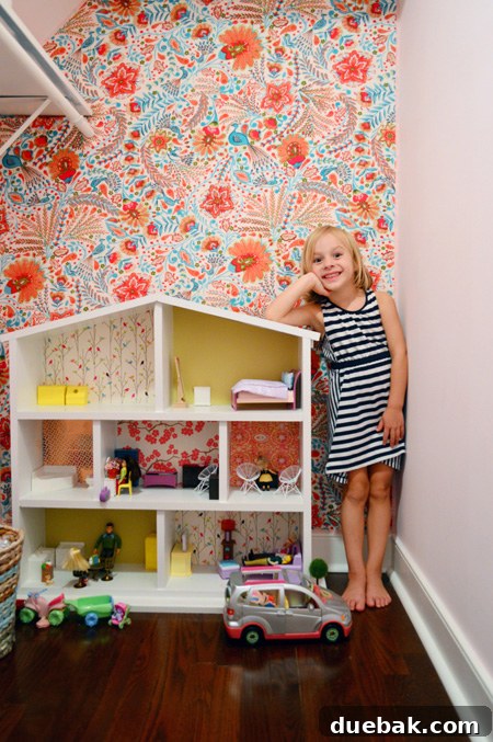 Transform Your Walls with Fabric 17 Happy Clara playing in her newly decorated closet hideaway