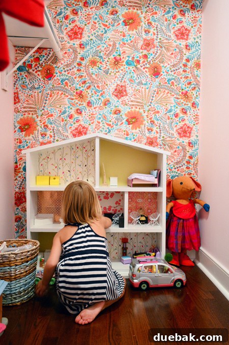 Transform Your Walls with Fabric 19 Clara's whimsical fabric-covered closet, a perfect play and storage space