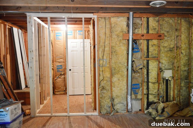 The Ultimate Laundry Room Makeover: From Demolition to Design 16 Two new walls framed by the professional framer
