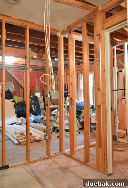 The Ultimate Laundry Room Makeover: From Demolition to Design 23 Old storage room door framing removed, showing new space