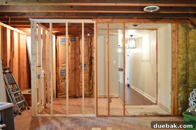The Ultimate Laundry Room Makeover: From Demolition to Design 26 Final view of the opened-up laundry room space after demolition