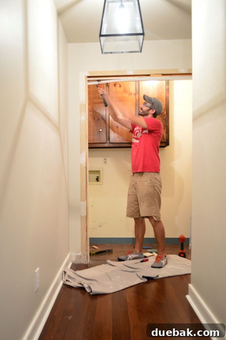 The Ultimate Laundry Room Makeover: From Demolition to Design 5 Careful removal of baseboards and trim during demolition