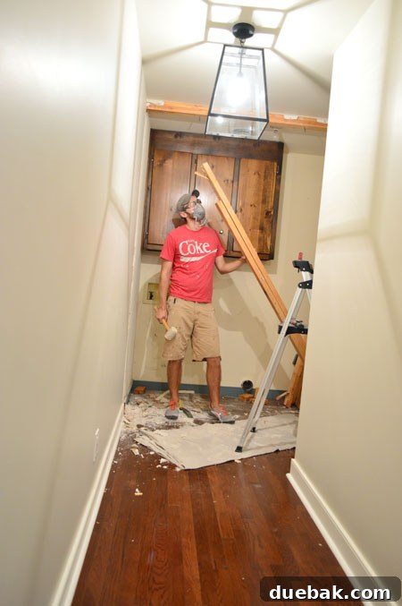 The Ultimate Laundry Room Makeover: From Demolition to Design 8 Old framing completely removed, opening up the space