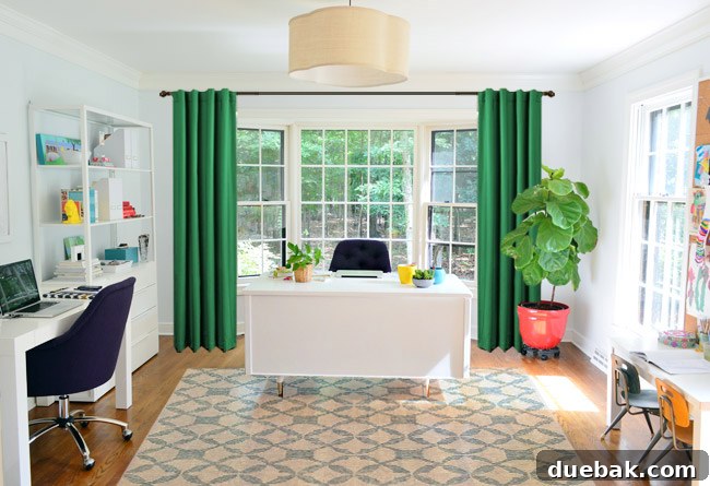 Conceptual image illustrating design elements like a dark curtain rod and patterned curtains to complement the navy office chairs.