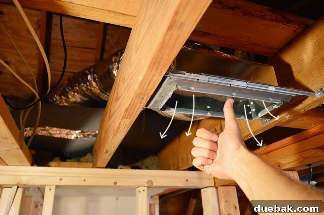 Routing New Laundry Exhaust Systems 34 Testing new HVAC ceiling vent after installation, showing thumbs up and cartoon air arrows indicating successful airflow