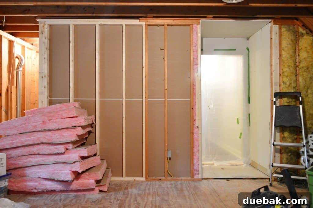 after photo of backside of laundry room with drywall completed on inside
