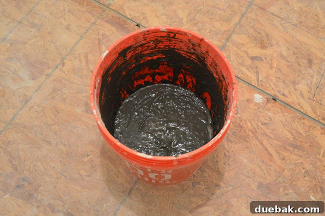 Spreading thinset for cement board installation