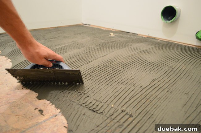 Pressing cement board into thinset