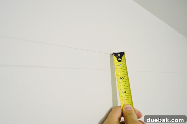 Mastering Ikea Cabinet Installation 15 The wall with two parallel level lines for cabinet installation