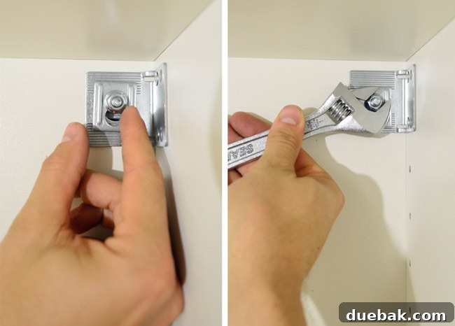 Mastering Ikea Cabinet Installation 20 Using a level to ensure the hung IKEA cabinet is perfectly straight