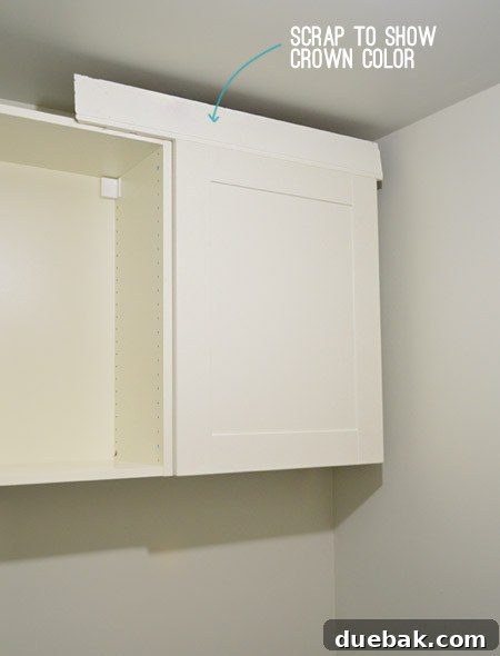 Mastering Ikea Cabinet Installation 26 Close-up of the Adel IKEA cabinet door next to a Simply White baseboard, showing color mismatch