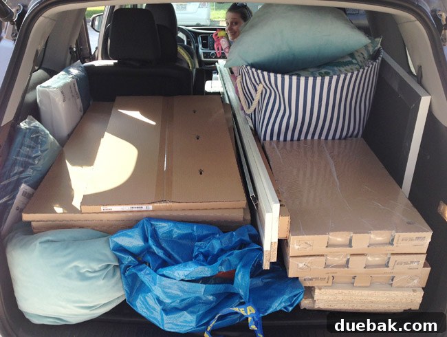 Mastering Ikea Cabinet Installation 6 A packed car trunk with IKEA cabinet boxes and components