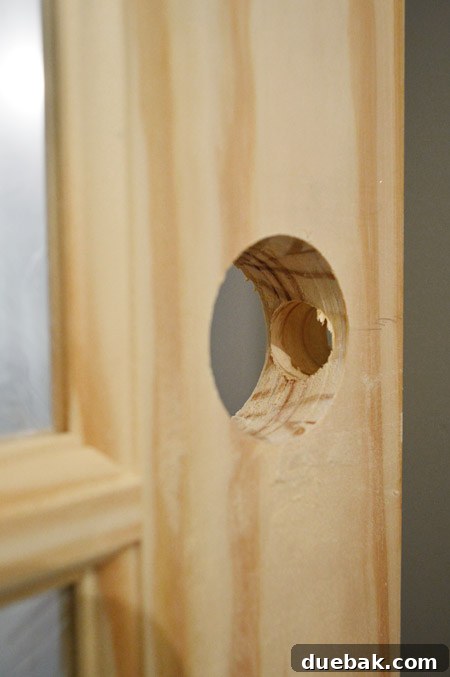 Finished Holes Created In Door Using Door Knob Template Kit From Ryobi