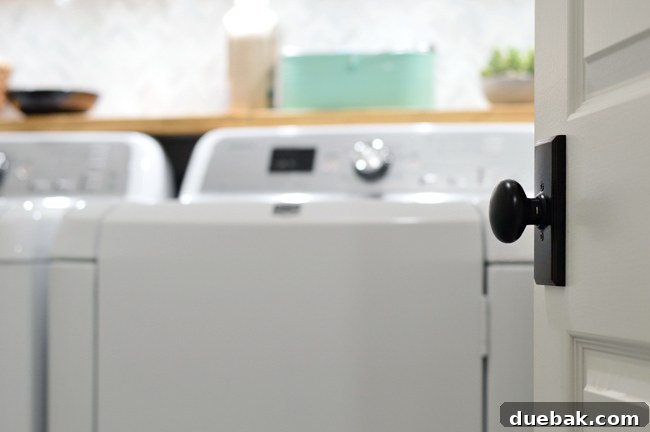 John posing in the new laundry room