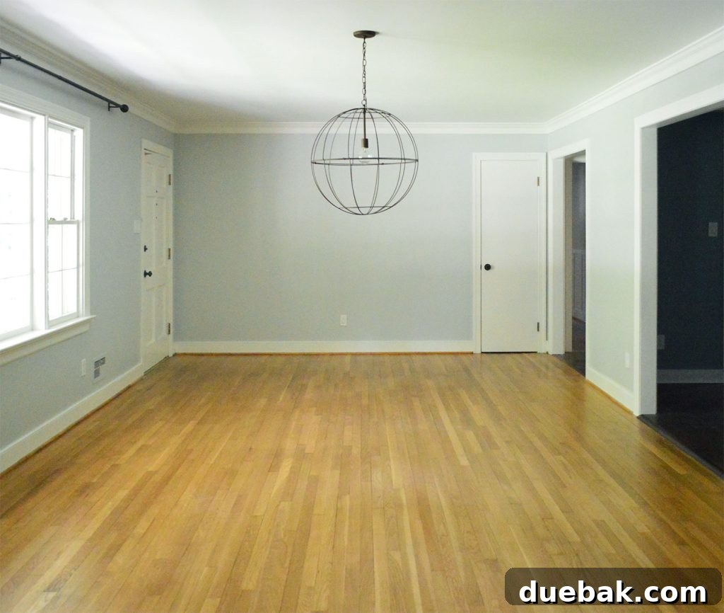 Revitalizing Hardwood Floors The Beginner's Handbook 15 Empty living and dining room with hardwood floors, completely cleared for refinishing
