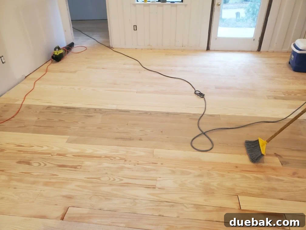 Revitalizing Hardwood Floors The Beginner's Handbook 17 Bare sanded oak floors in a beach house, perfectly prepared for stain or clear coat application