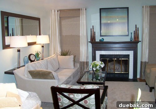 Janis's transformed living room after makeover, now bright and modern with new furniture and wall color