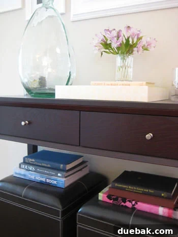 Before: Basic Console Table with Old Drawer Pulls Old hardware on a console table drawer, showing basic and uninspiring drawer pulls