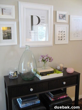 Finished Look: Black and White Anthropologie Hardware Finished console table with black and white Anthropologie drawer pulls complementing wall decor