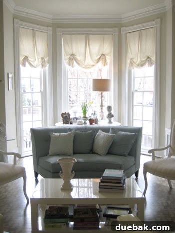Bay window with dreamy, beachy decor in soft muted colors and neutrals