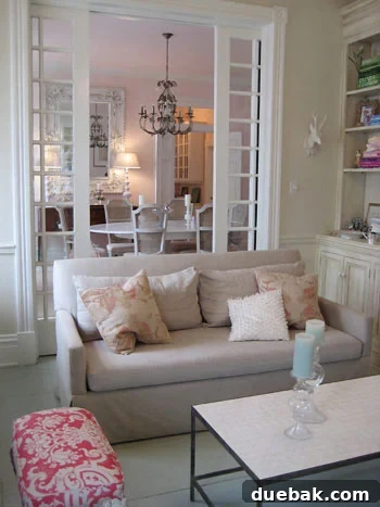Dreamy, chic, and feminine parlor with painted floors, ideal for a family room