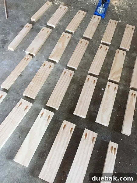 Floating shelf supports made from 1x3 pine boards cut to the same length and drilled with pocket holes using a Kreg Jig for strong joints
