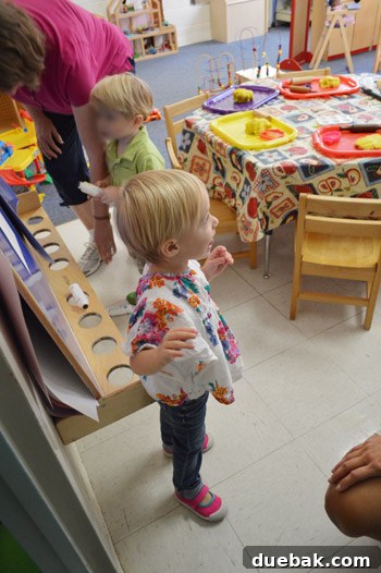 Fresh Start in the Classroom 3 Clara, full of joy, running into her preschool classroom on her first day, radiating excitement and independence.