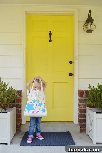 Fresh Start in the Classroom 5 Clara proudly posing with her new school bag in front of her house, ready for her first day of preschool.