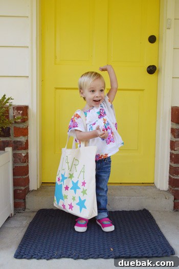 Fresh Start in the Classroom 8 Clara holding her hand up in a favorite new pose, adding to the charm of her first day of school photos.