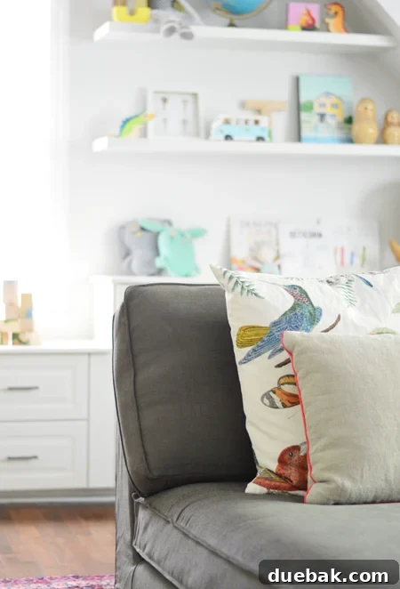 Bonus Room Glow Up 18 Cozy IKEA Kivik Sofa with Bird Pillow in Bonus Room