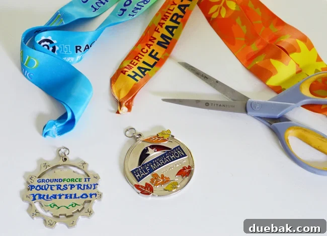 Cherished Miles, Festive Shine: Crafting Medal Ornaments 5 Image demonstrating the action of cutting ribbons off of race medals to attach new ornament ribbon