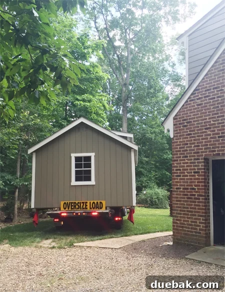 Shed-Delivery-Driving-Around-Back-Wide-Load