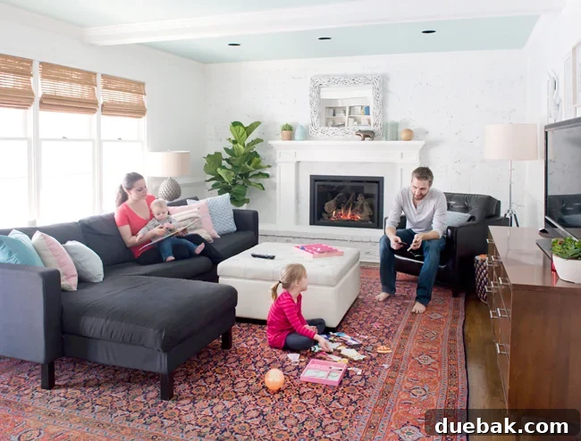 Young House Love living room showcasing a large, anchoring area rug