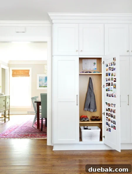 Custom Hidden Mudroom Cabinets in Renovated Kitchen