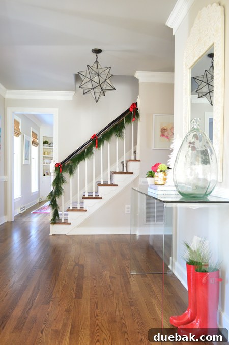 Step Inside Our Festive Home See Our Christmas Tree 14 xmas-decor-foyer-console-with-stairs