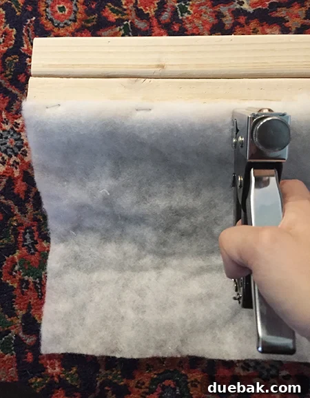 Crafting a Festive Painted Village 12 Wrapping Wood Boards with Batting for Snowy Effect
