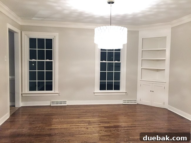 Dining room overloaded with kitchen items during floor renovation